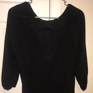 Black blouse with bow in back